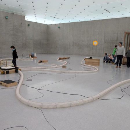 Floor, Flooring, Person, Clothing, Footwear, Shoe, Indoors