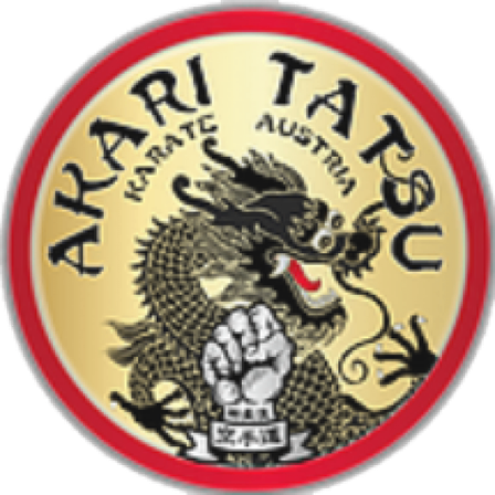 Das Logo für Arari Tatsu Karate Austria zeigt einen Drachen mit einer Faust und den Text Arari Tatsu Karate Austria.