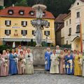 Dress, Fashion, Formal Wear, Gown, Person, Flower Bouquet, People, Fountain, Wedding, Wedding Gown
