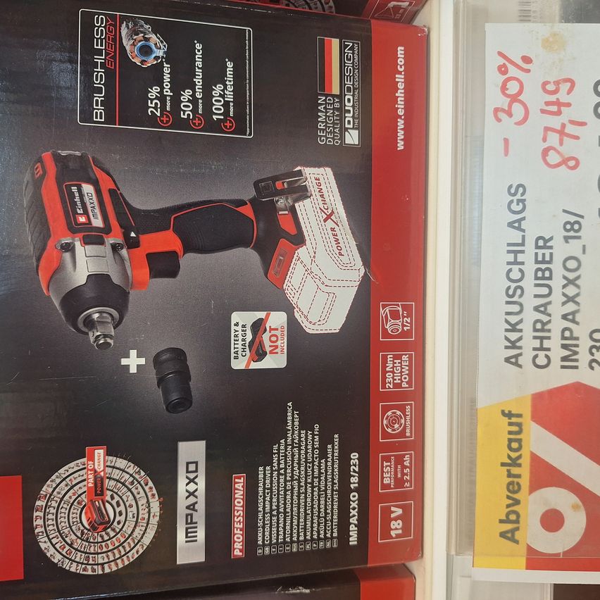 A black and red box for an IMPAX XD professional cordless impact wrench, highlighting features like 25% more power, 50% more endurance, and 100% lifetime warranty. The box also includes a battery and charger.