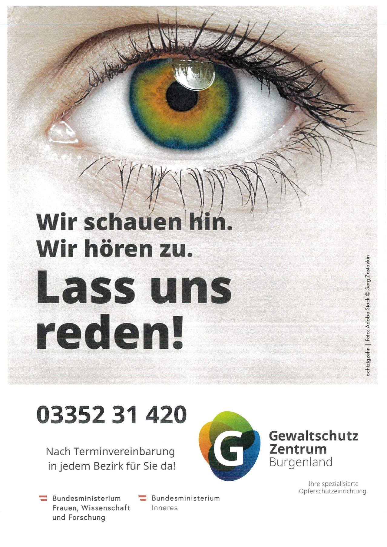 An advertisement featuring an eye with the message 'We look at you. We listen to you. Let us speak!' with a phone number and logo for Gewaltschutz Zentrum Burgenland.