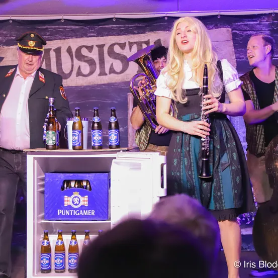 Adult, Male, Man, Person, Stage, Female, Woman, Group Performance, Face, Musical Instrument