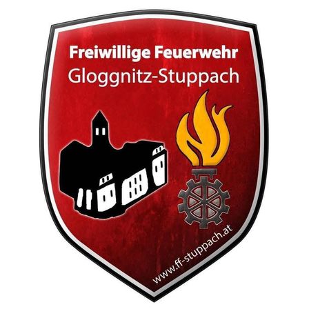 Das Logo der Freiwilligen Feuerwehr Glognitz-Stuppach zeigt ein Gebäude, eine Flamme und ein Zahnrad mit einer Website-Verknüpfung.