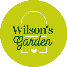 Grüner kreisförmiger Logo für Wilsons Garten mit einer weißen Tasche und einem Blattsymbol in der Mitte