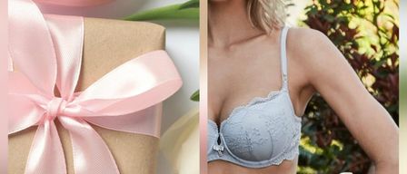Eine Werbung für eine Modemarke zeigt eine Frau in einem blauen Spitzen-BH und einem Geschenkkarton mit einer rosa Schleife. Die Worte 'Happy Easter Shopping' und 'eve dessous Serie Pearl' sind zu sehen.