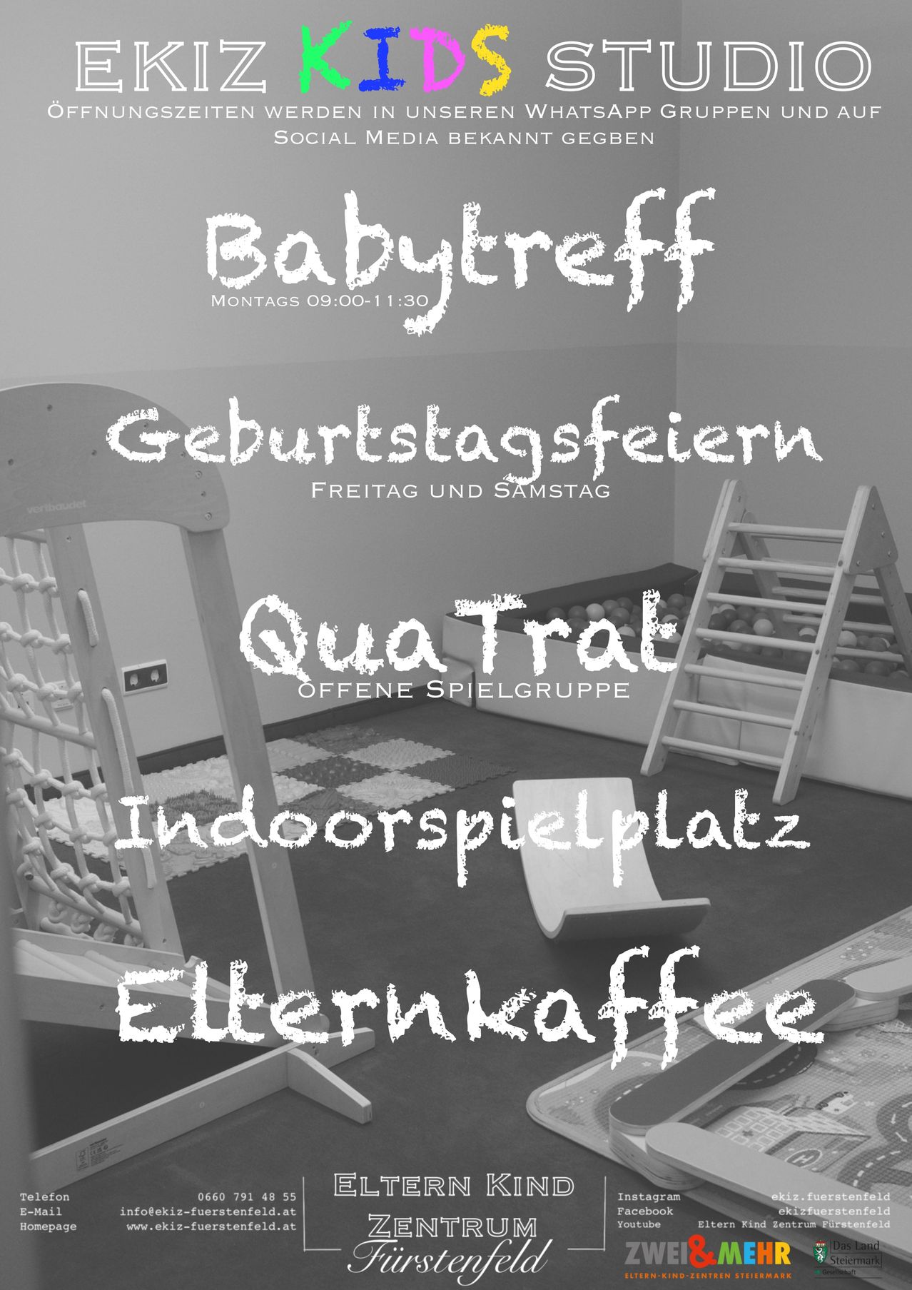 A black and white image of a room with a banner for 'Babytreff'. The room contains various toys, a wooden ladder, and a chair. There is a mat and some balls.