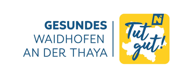 Auf einem weißen Hintergrund sind zwei Logos zu sehen. Das erste ist blauer Text, der 'GESUNDES WAIDHOFEN AN DER THAY' lautet. Das zweite ist ein gelbes Quadrat mit 'Tut gut!' in Blau und einem Stern darüber.