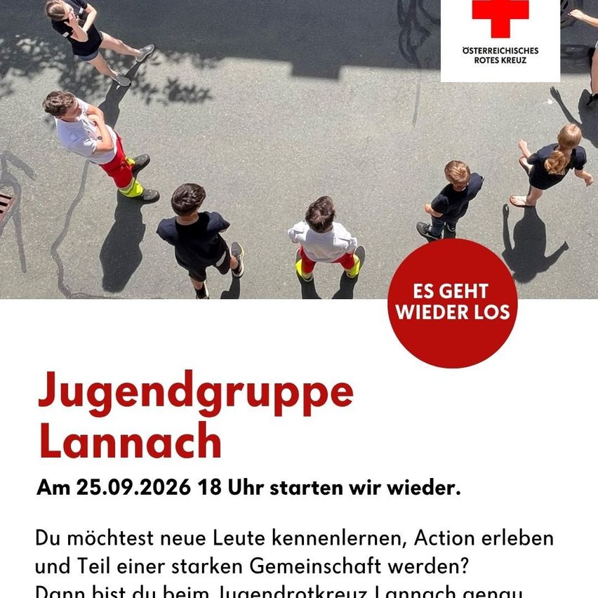 An aerial view of a group of children playing on a street. A circular red sign with white text reads 'ES GEHT WIEDER LOS'. The text below reads 'Jugendgruppe Lannach' and 'Am 25.09.2026 18 Uhr starten wir wieder.' The image is clear and well-composed.