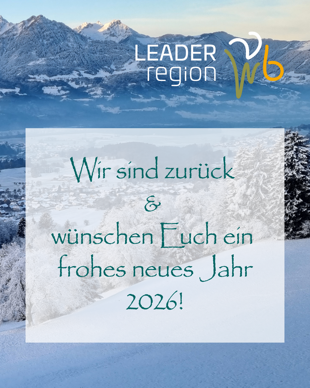 Snowy mountains backdrop with a message: 'We are back and wish you a happy new year 2026!'. The message is written in green font on a white background.