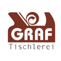 Das Bild zeigt das Logo eines Unternehmens namens Graf Tischlerei, dargestellt in fetten, großgeschriebenen Buchstaben mit einem stilisierten Grafikelement.