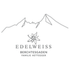 Das Edelweiss-Logo für Berchtesgaden Familie Hettgger zeigt eine stilisierte Bergkette mit einem Blumendesign in der Mitte.