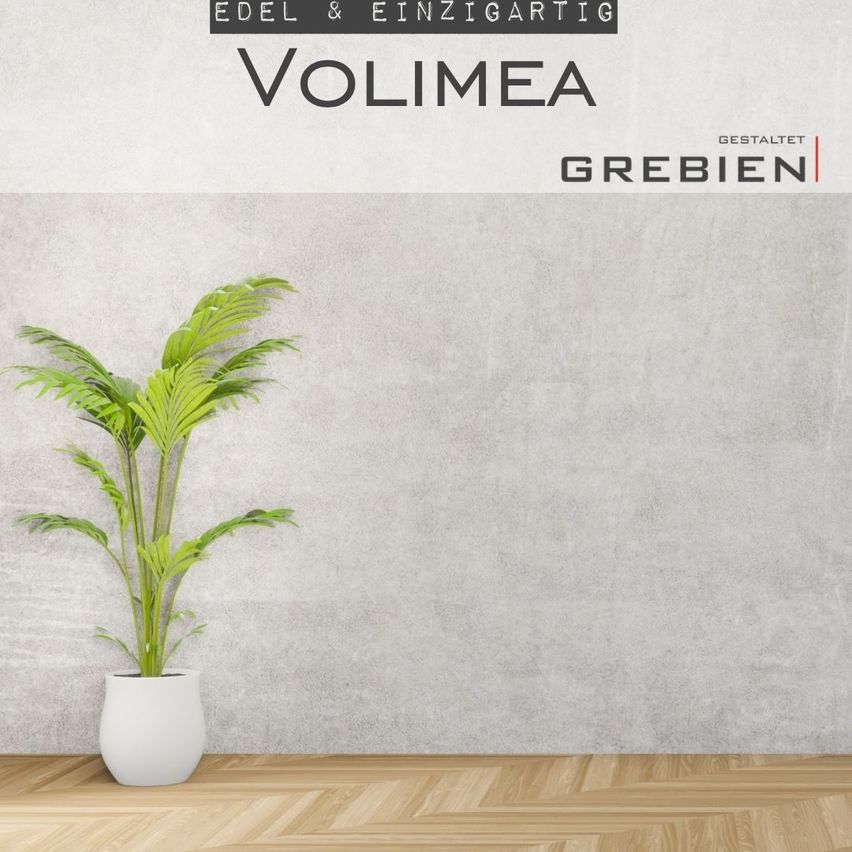 Eine dekorative Innenwand mit hochwertiger Spachteltechnik und strukturierter Oberfläche in einem modernen Wohnraum.
