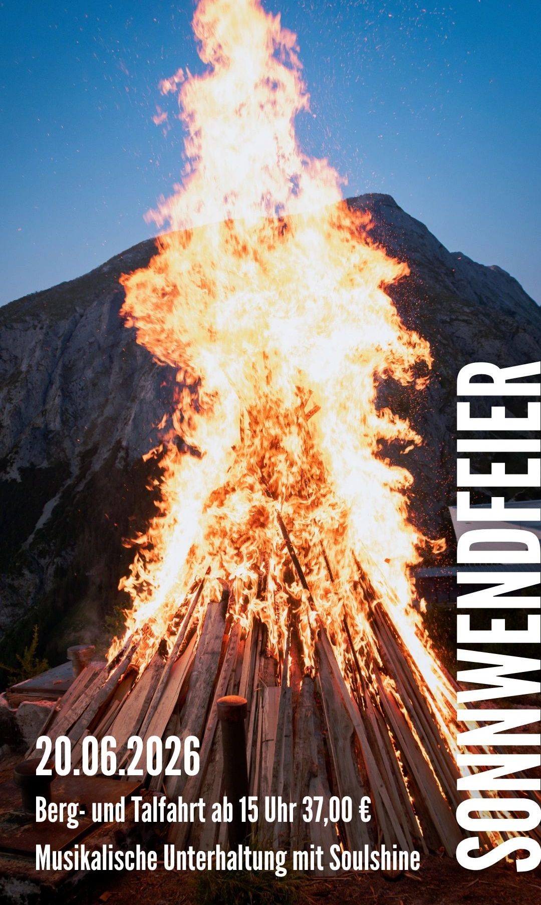 A bonfire burns brightly in the mountains, surrounded by wood and casting shadows. The word Wendefeuer is displayed on the right side.