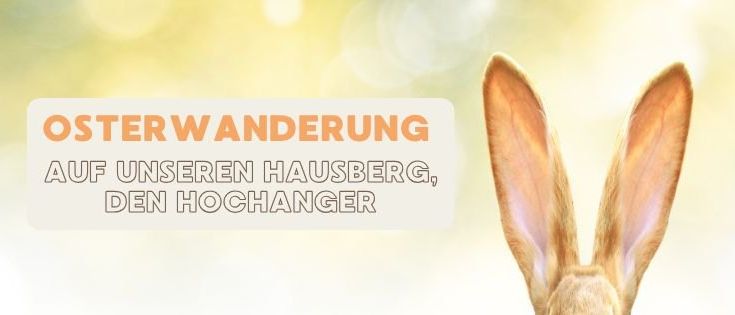 Ein Bild der Ohren eines Kaninchens mit dem Text 'OSTERWANDERUNG' und 'AUF UNSEREN HAUSBERG, DEN HOCHANGER' in Orange auf einem weißen Hintergrund.