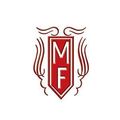 Ein rotes und weißes Logo mit den Buchstaben 'MF' in der Mitte, umgeben von dekorativen Flammen.