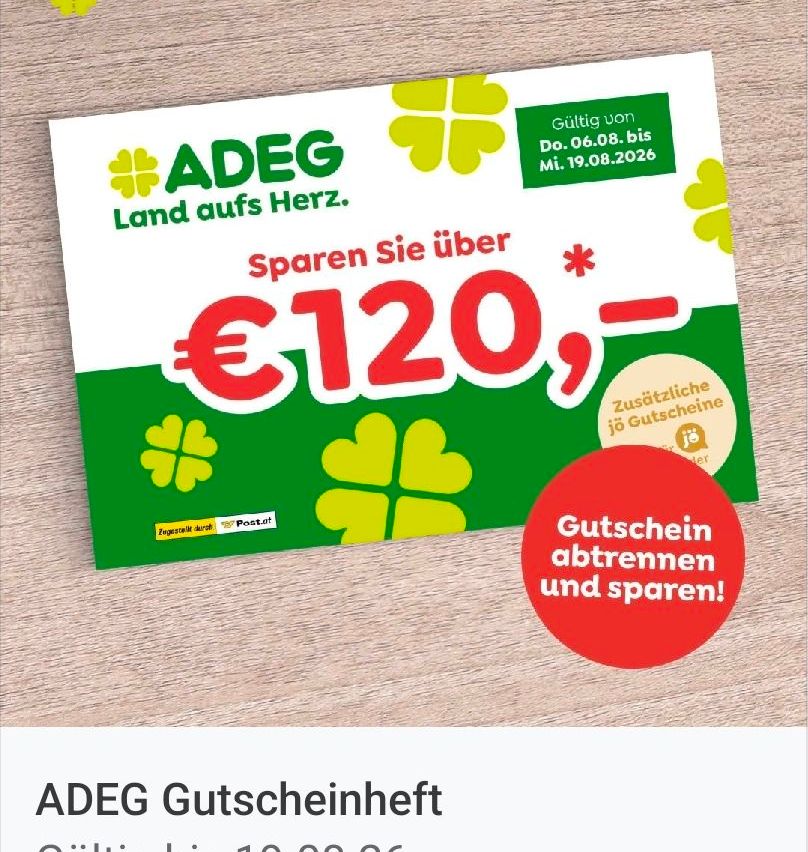 A promotional poster for ADEG, a German supermarket chain, advertising a savings coupon for €120. The poster features a green background with shamrocks and a red circle with the text 'Gutschein abtrennen und sparen!' (Coupon detach and save!). The validity period is from June 6, 2026, to August 19, 2026.