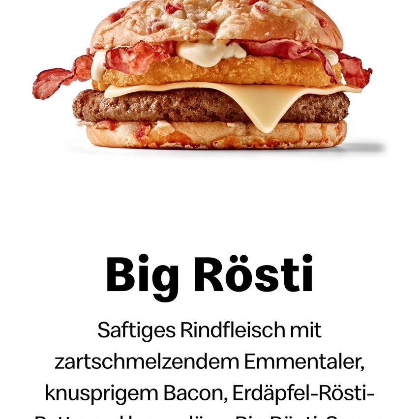 Das Bild zeigt einen Big Rösti Burger mit Schichten aus saftigem Rindfleisch, cremigem Emmentalerkäse, knusprigem Speck und Kartoffelrösti. Er wird vor einem weißen Hintergrund präsentiert.