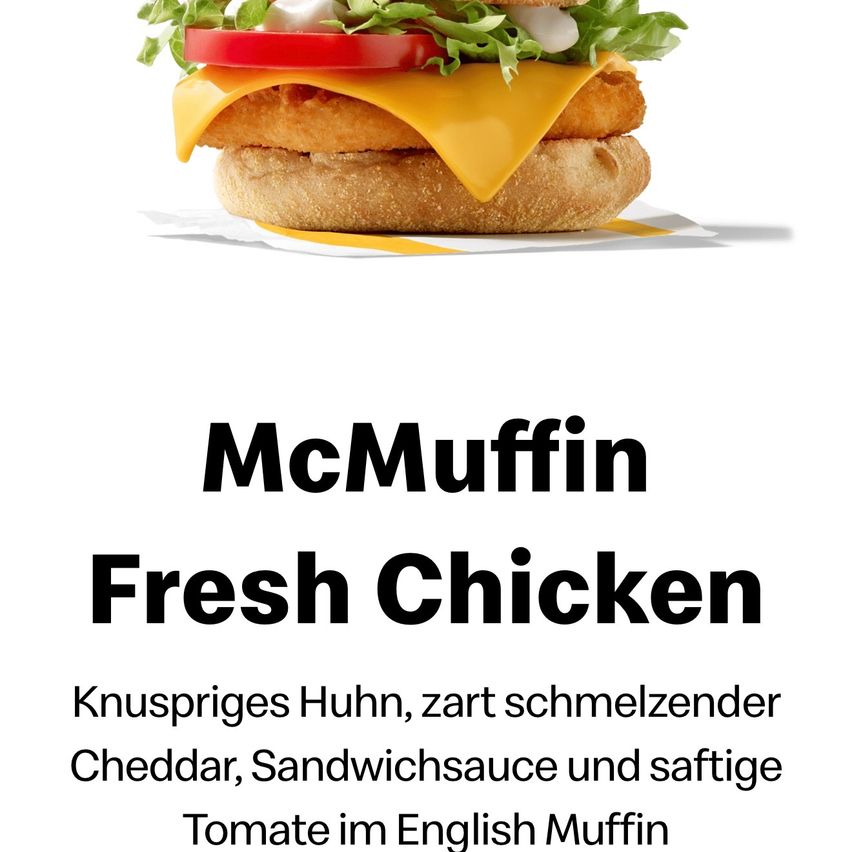 An advertisement for the McMuffin Fresh Chicken, featuring a sandwich with a crispy chicken patty, lettuce, tomato, and cheese on an English muffin.