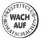 Ein kreisförmiges Logo mit dem Text 'WACH AUF' in fetten, schwarzen Buchstaben auf weißem Hintergrund. Es ist Teil des 'FREIZEIT CLUB ROMATSCHACHEN'.