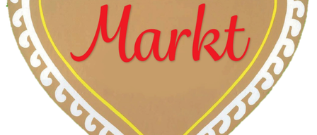 Ein Lebkuchenherz mit gelber Umrandung und dem Wort 'Markt' in Rot geschrieben.