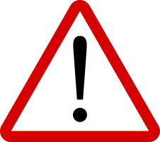 A red and white triangular warning sign with a black exclamation mark in the center.