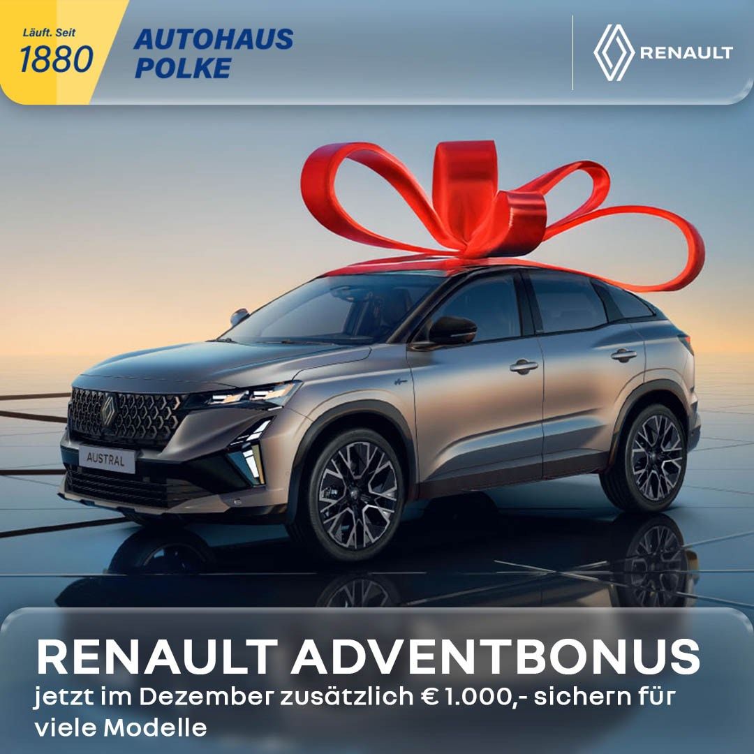 A silver Renault SUV with a red ribbon tied around it, advertising Renault Advent Bonus with an additional €1,000 in December for many models.