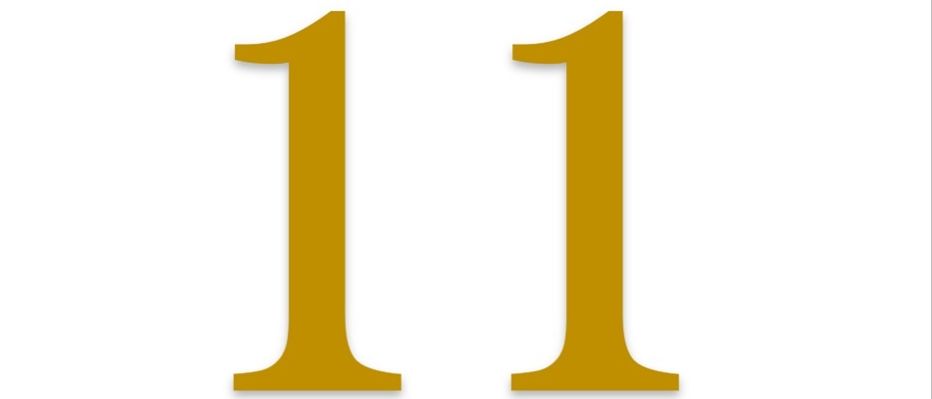 Das Bild zeigt die Zahl 11 in einer fetten, serifenlosen Schrift. Die Zahl erscheint zweimal, eine nach der anderen, auf einem schlichten weißen Hintergrund.