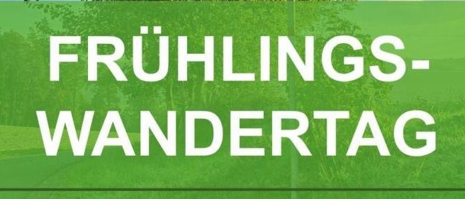 Plakat für den Frühlingswandertag am Sonntag, 19.04.2026. Das Plakat hat einen grünen Hintergrund mit weißem Text. Es zeigt ein Wegweiser mit zwei Schildern. Das obere Schild sagt 'Kiesberg' und 'Aussichtsturm'. Das untere Schild sagt 'Sternberg'. Das Plakat ist vor einem blauen Himmel mit Wolken.