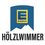 EDEKA Hölzlwimmer GmbH-Logo. Das Logo von Holzlwimmer wird mit blauem Hintergrund und gelber Bergform angezeigt, wobei das Wort 'Edeka' oben steht.