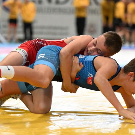 Bild enthält, Person, Sport, Wrestling, Adult, Male, Man, Clothing, Shorts