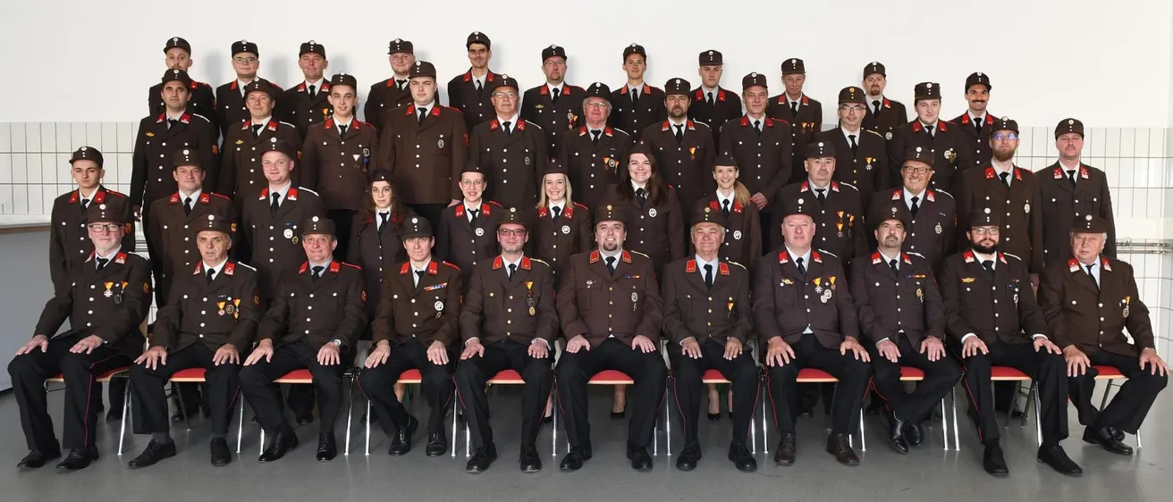 People, Person, Groupshot, Adult, Male, Man, Clothing, Coat, Officer, Classroom