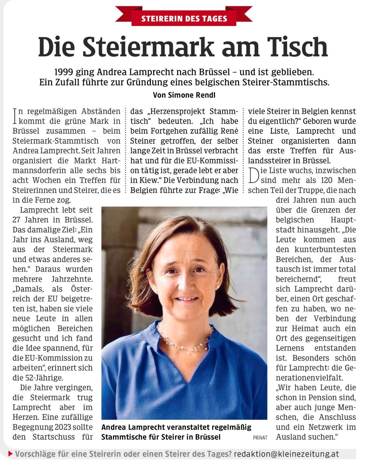 A photo of Andrea Lamprecht, a woman with short hair, smiling and looking at the camera. She is wearing a blue blouse and a pearl necklace. The background is blurry, and there is a text overlay with German text.