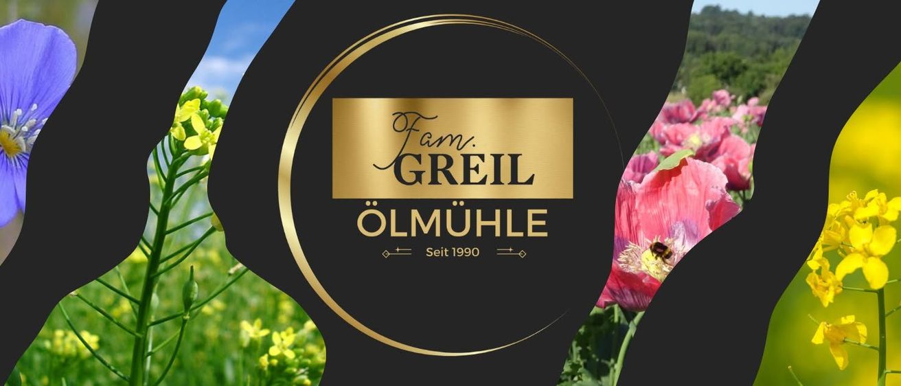 Die Mühle von Familie Greil, Olmuhle, ist seit 1990 in Betrieb und von einem üppigen Feld mit gelben und rosa Blumen umgeben.