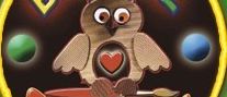 The logo features a round design with a yellow border, displaying an owl holding a paintbrush. The owl has a heart on its chest, and there are three colorful balls surrounding it. The text reads 'BASTEL Gramm' in bold letters.
