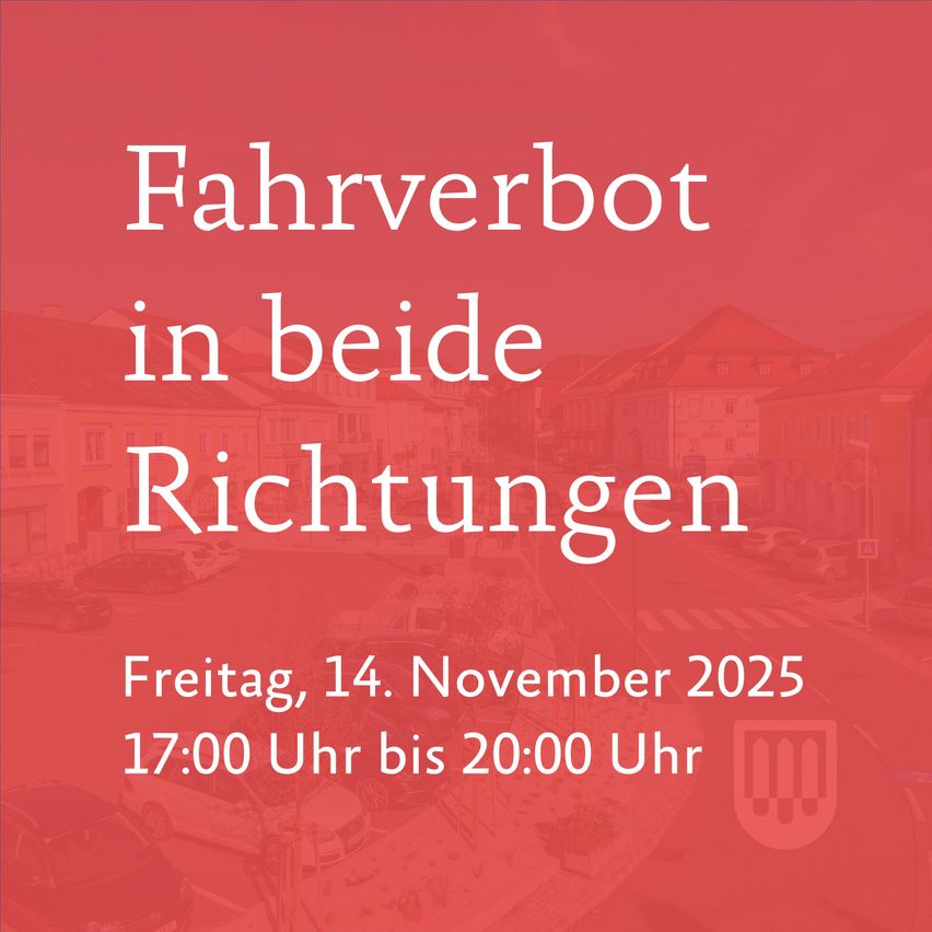 A red poster announces a traffic ban in both directions on Friday, November 14, 2025, from 5 PM to 8 PM. There are buildings, cars, and a logo on the poster.