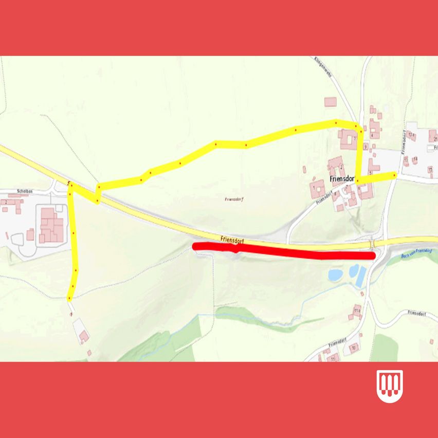 Eine Karte, die eine Route mit einer roten Linie zeigt, die eine Umleitung anzeigt. Die Route ist in Gelb markiert mit mehreren Punkten entlang des Weges. Die Karte enthält einen Ort namens 'Friendorf'.