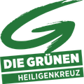 Grünes Logo mit einer geschwungenen 'S' und den Worten 'Die Grünen Heiligenkreuz'.