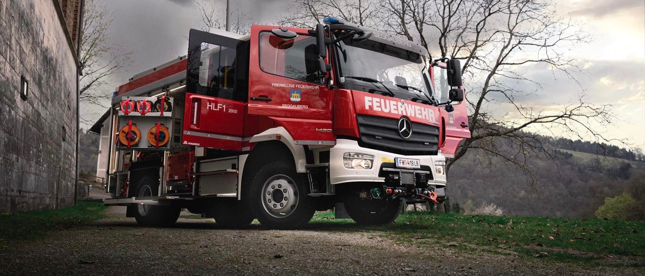 Bild enthält, Transportation, Truck, Vehicle, Architecture, Building, Machine, Wheel, License Plate, Bumper