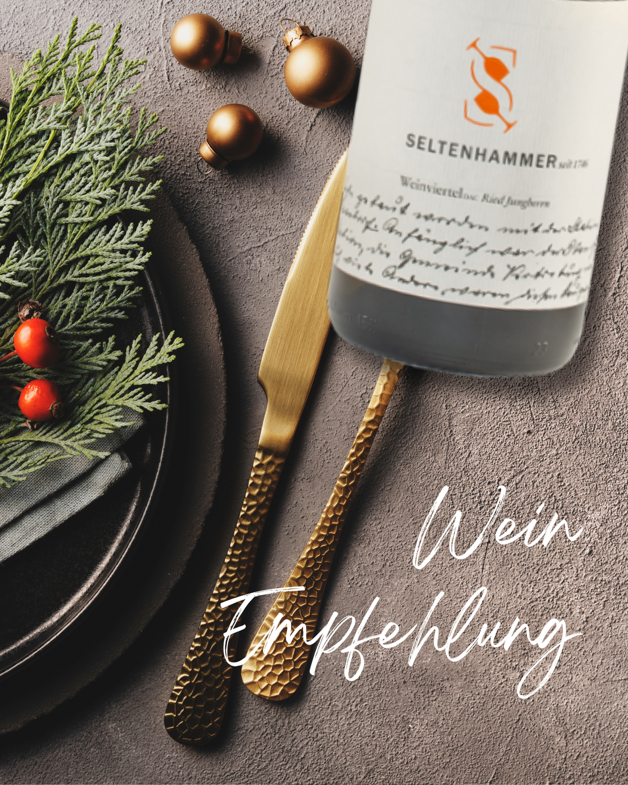A bottle of Seltenhammer wine, a knife, and a plate with a wreath of green leaves and red berries are on a gray surface.