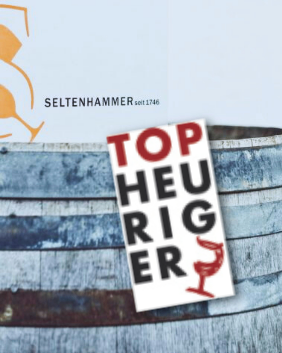 An image shows a blue barrel with a white sign that reads 'TOP HEVRIG ER' on it, a red wine glass, and the logo for Seltenhamer, established in 1746.
