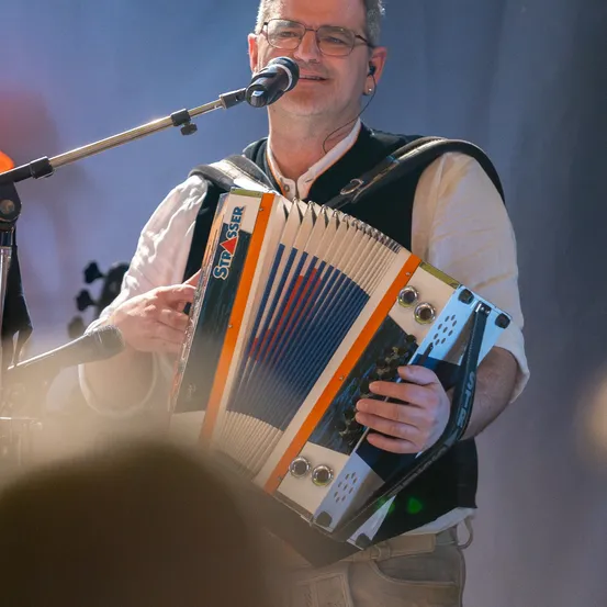 Adult, Male, Man, Person, Microphone, Musical Instrument, Face, Finger, Glasses, Solo Performance