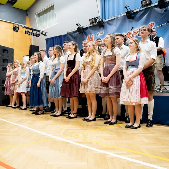 Groupshot, Person, Shorts, Floor, Flooring, Dress, People, Stage, Shoe, Crowd