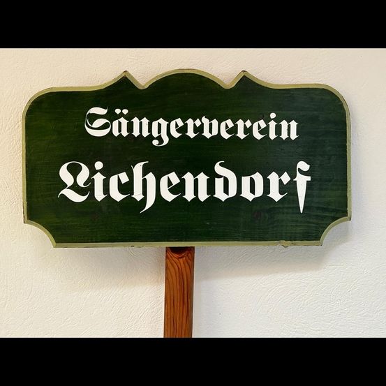 Bild enthält, Sign, Symbol, Text