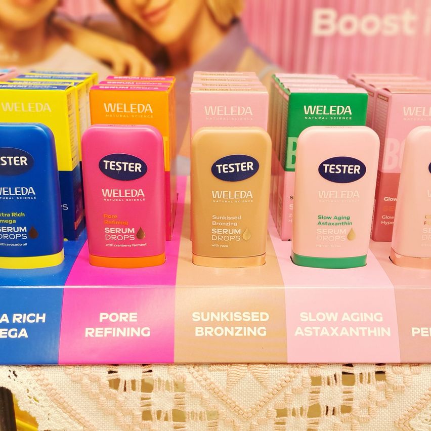 Multiple Weleda serum drops on display, including Rich Omega, Pore Refining, Sunkissed Bronzing, and Slow Aging Astaxanthin.