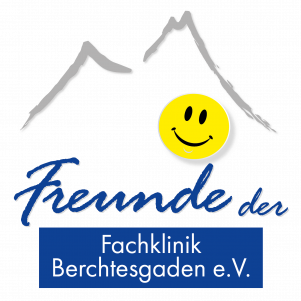 Ein kreisförmiges Logo mit Bergen und einem lächelnden Gesicht und darunter der Text 'Freunde der Fachklinik Berchtesgaden e.V.'.