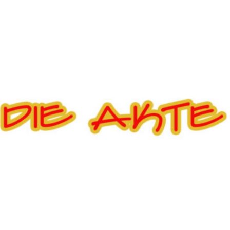 Ein weißer Hintergrund mit dem Wort 'Die Akte' in fetter roter und gelber Schrift geschrieben.