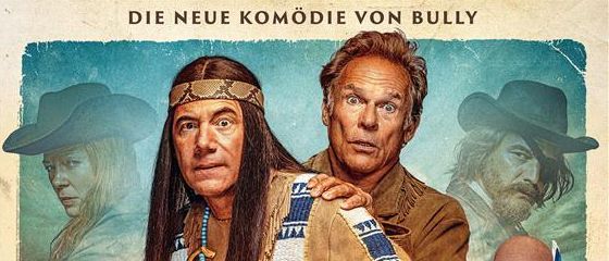Filmplakat mit einem Mann in indianischer Kleidung und einem anderen mit Cowboyhut, beide lächeln, mit einem dritten Mann in der Mitte, der eine blau-weiße Decke hält.
