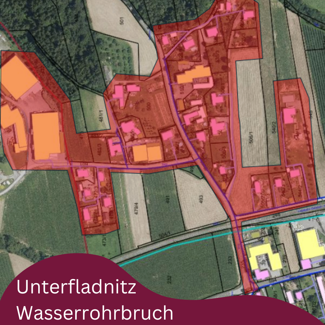 A map showing an aerial view of Unterfladnitz Wasserrohrbruch, highlighted with various colored zones and labels.