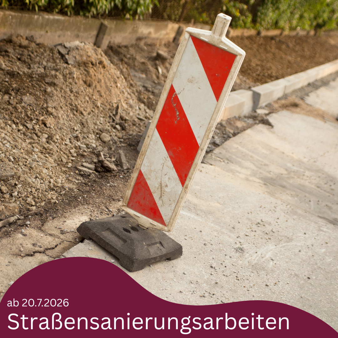 Straßenarbeiten: Absperrung mit rot-weißer Markierung auf Baustelle