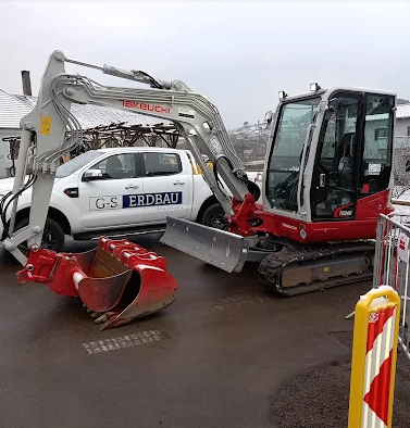 Bild enthält, Person, Worker, Machine, Bulldozer